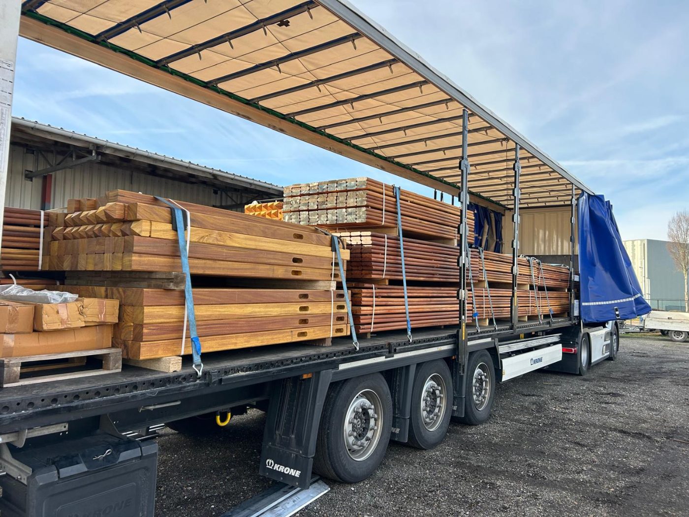 Full truckload of fencing materials leaving the yard